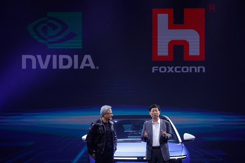 Foxconn Chairman Liu Young-way and Nvidia Corp CEO Jensen Huang speak during Foxconn's annual Tech Day in Taipei